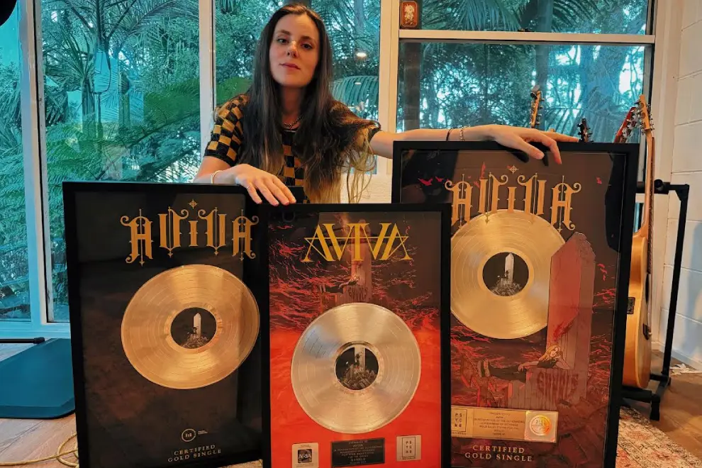 AViVA with her gold and platinum records