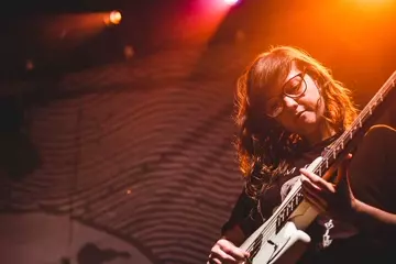 Kelly-Dawn Hellmrich on-stage with Camp Cope. Photo by Jodie Downie.
