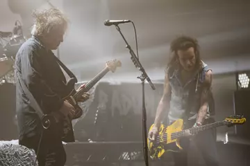 Gallup onstage with Robert Smith in 2019