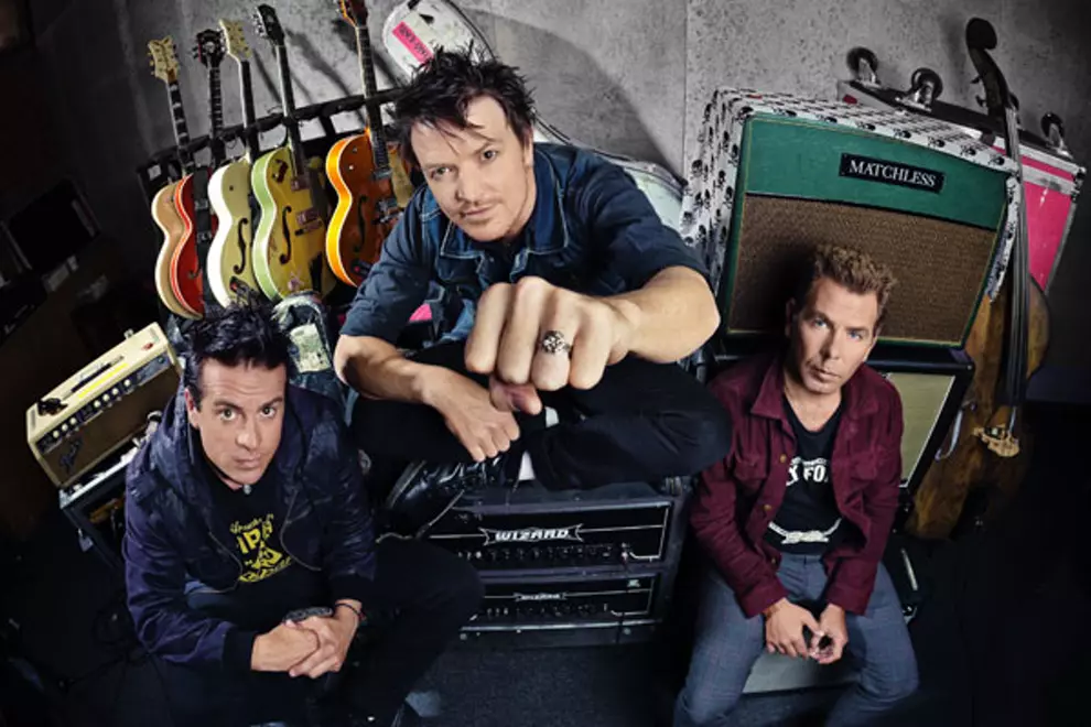 Chris Cheney (centre) is working on his debut solo record