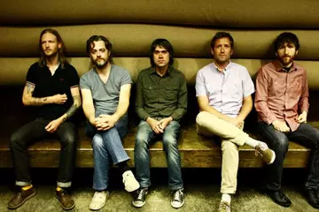 Erin Tate (centre) with Minus The Bear