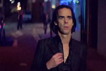 Nick Cave - calls his bandmates big sloppy whores; still gets the girl.