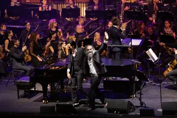 Warren Ellis, who has purchased a wildlife sanctuary this week, with Nick Cave at the Sydney Opera House in 2019 (pic by Daniel Boud)