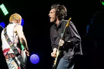 Josh Klinghoffer (right) performing with Red Hot Chili Peppers in Australia
