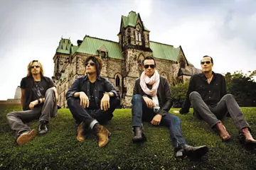 Scott Weiland with Stone Temple Pilots in 2011. (Second from right)
