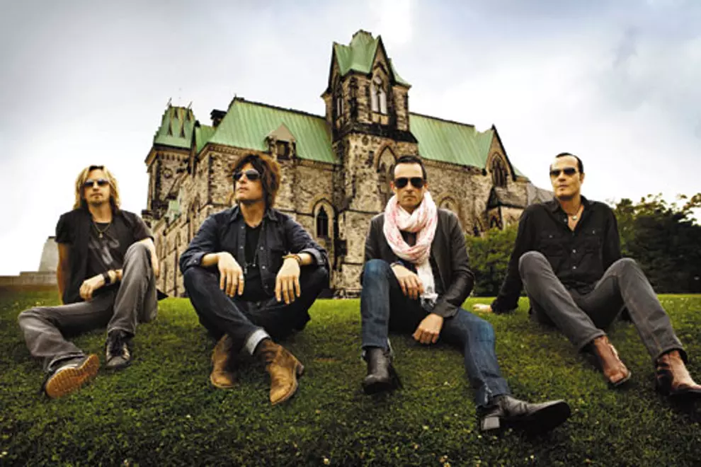 Scott Weiland with Stone Temple Pilots in 2011. (Second from right)