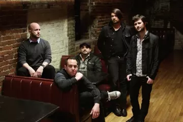 John Nolan (far right) with Taking Back Sunday