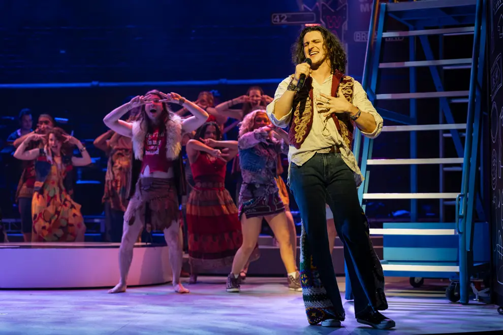 Alex Cooper performing in 'Hair'