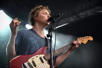 Pond's Nick Allbrook performing at Laneway Sydney yesterday. Pic by Josh Groom.