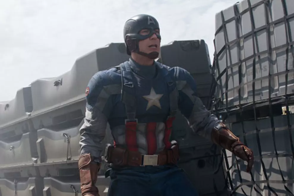 Captain America, most likely about to jump through a window.