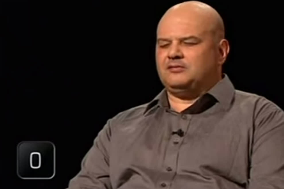 That's his "Crap, it was 'Love Will Tear Us Apart' face