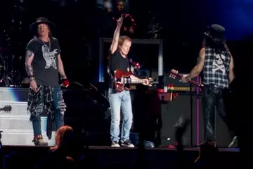 Angus Young on stage with Guns N' Roses in Melbourne last night. Photo by Andrew Briscoe