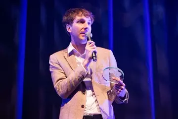 Neale accepting Song Of The Year award. Pic by Bianca Holderness