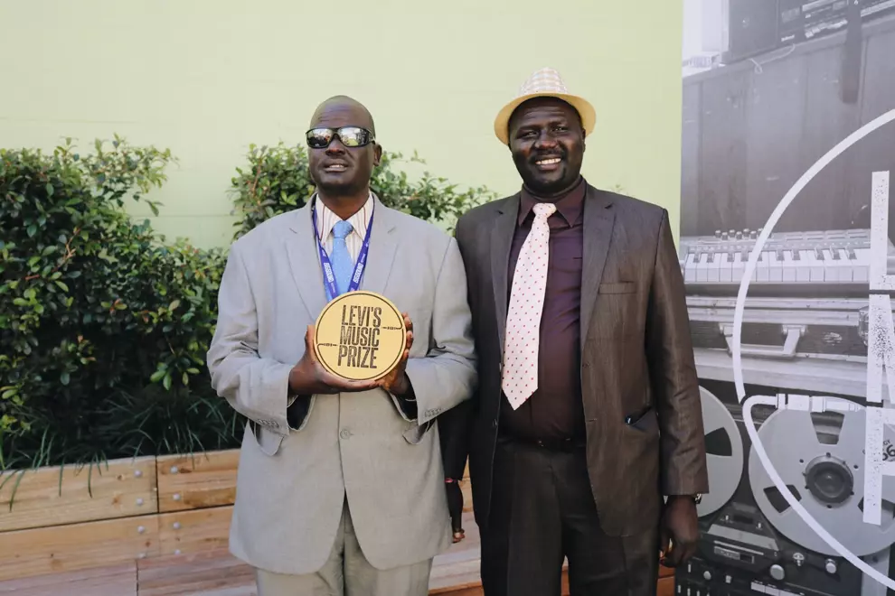 Gordon Koang and his cousin Paul Biel accepting the Levi’s Music Prize.