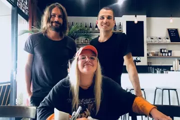 Regan Lethbridge (left), Jackson Walken-Brown (right), Tones And I (front)