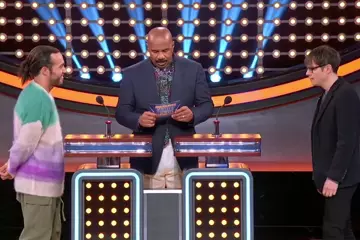 L to R: Fall Out Boy's Pete Wentz, host Steve Harvey & Weezer's Rivers Cuomo