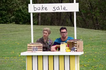 Levy with co-host Julia Chan. Image via YouTube.