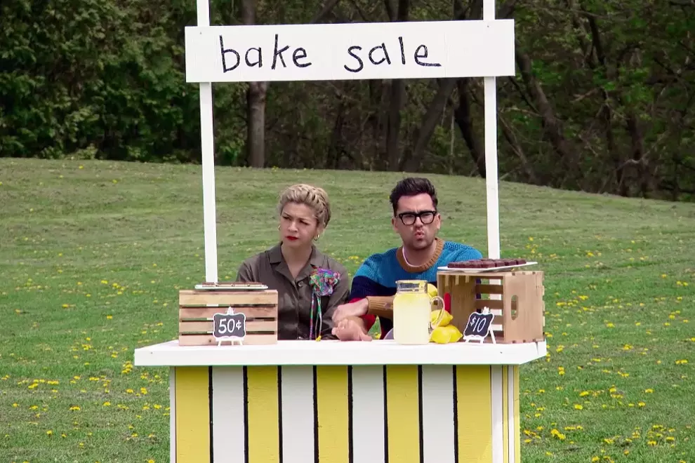 Levy with co-host Julia Chan. Image via YouTube.