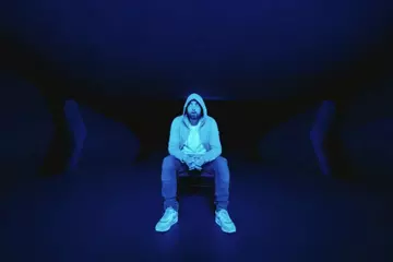 Eminem in the 'Darkness' video. Pic via YouTube.