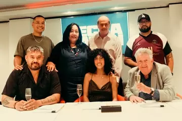 L-R back row: Ricky Simandjuntak (manager), Tammy Hatch (Hatch’s mother), Tony Hatch (Hatch’s father), Willstah (producer) L-R front row: Latukefu, Hatch, Denis Handlin AO