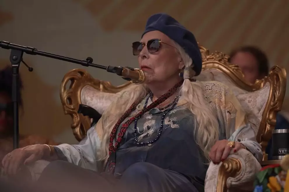 Joni Mitchell on stage in Newport