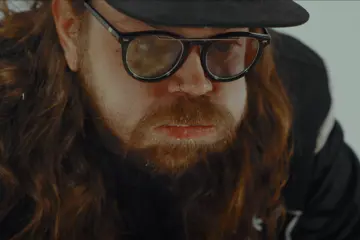 FANGZ vocalist Josh Cottreau with a mouthful of egg