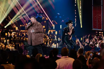 Jelly Roll & Lainey Wilson performing at the iHeartRadio Music Awards