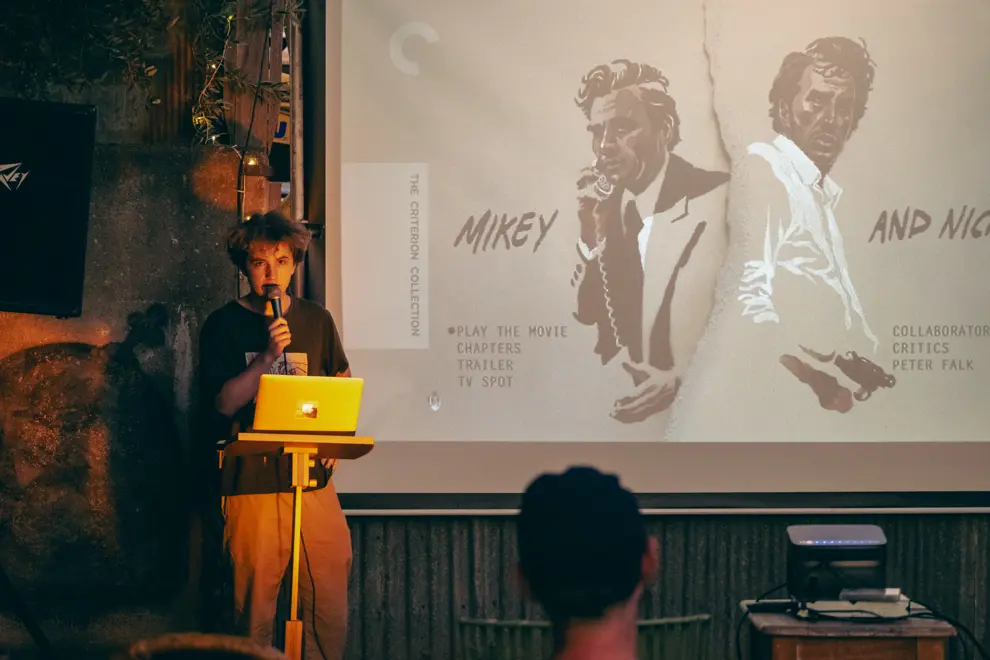 Sam Wilson screening a film at Ern Malley