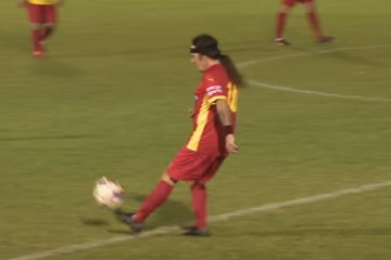 Iron Maiden bassist Steve Harris tearing up the field at Macedonia Park, Perth.