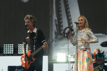 Billie Joe Armstrong performing with The Go Go's at Coachella