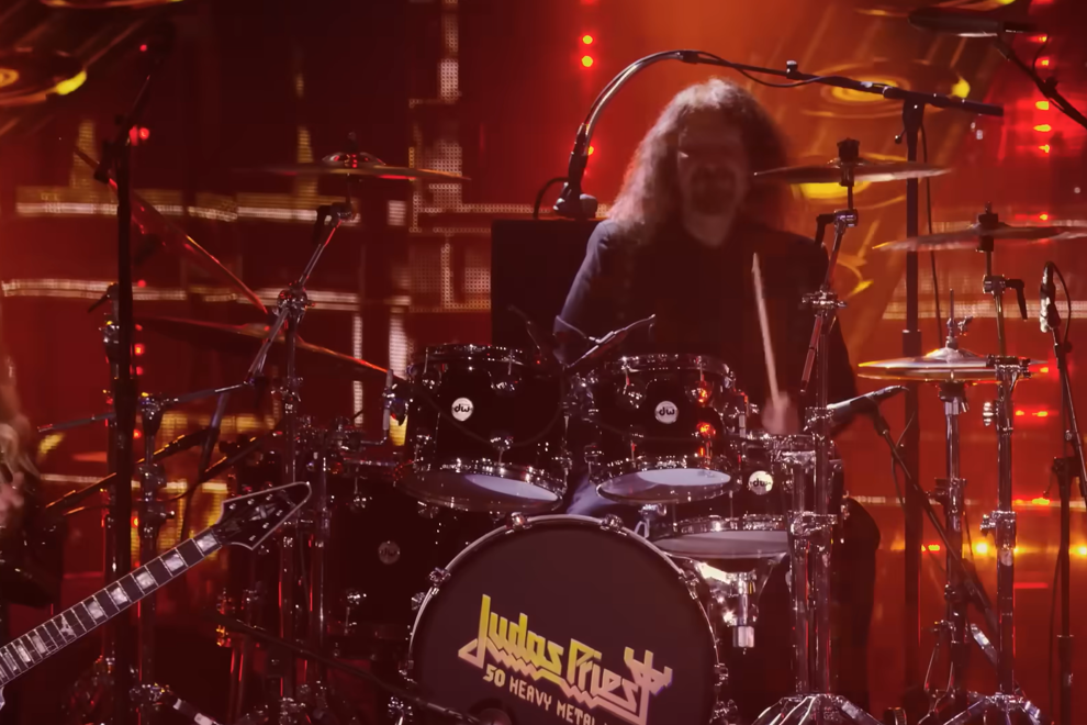 Les Binks performing with Judas Priest at the Rock and Roll Hall of Fame