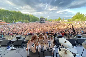 Toby Beard with her band performing live