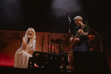 Maisie Peters and Ed Sheeran performing together in Melbourne