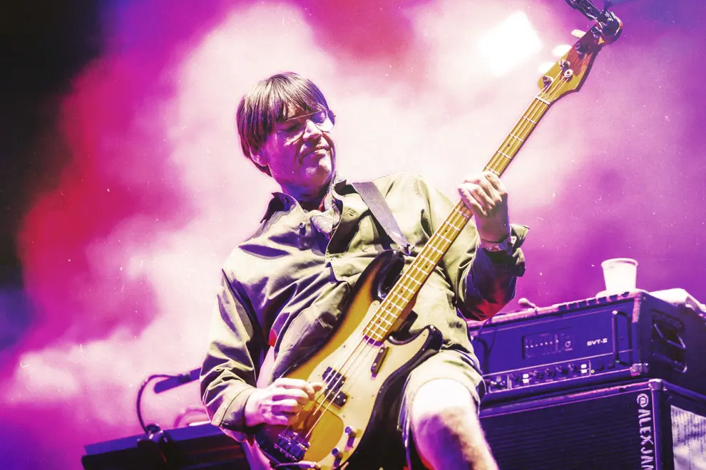 Alex James performing live