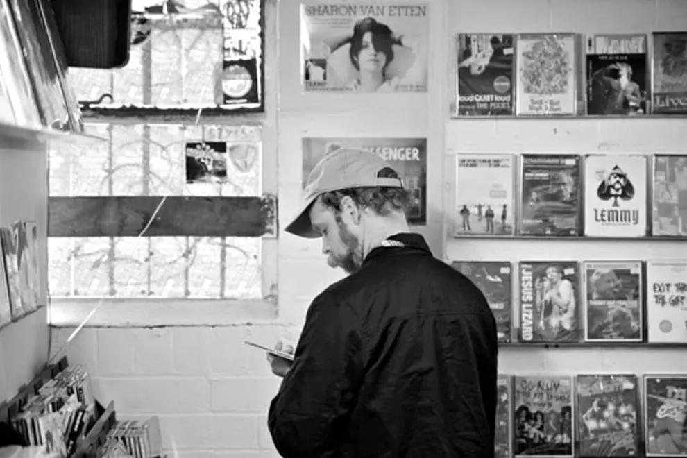 Bonnie Prince Billy looking through Music Farmers' collection...