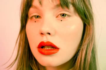 Live Review: PREMIERE: Time is the killer in Lxandra's poignant new clip for "Flicker"