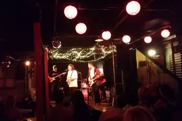 A band performs at The Wheatsheaf