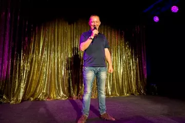 Owner/operator John McAllister at Comedy Lounge. Photos by Karen Lowe